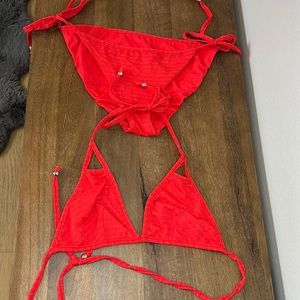 Reversible. Vitamin A. Gently used. As is. Red/orange. Swim suit. Adjustable